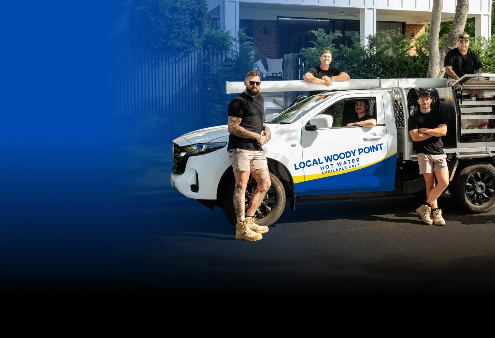 Local Woody Point Hot Water team with the ute